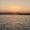 Sonnenuntergang über dem Fluessen (See)